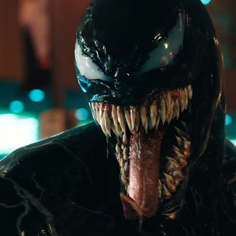Venoms ansikte med lång tunga och mycket tänder