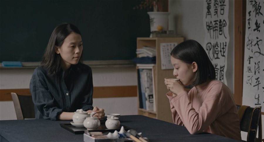 Eunhee dricker te med sin nya favoritlärare